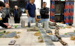 The Antargran and NUA commanders survey the City and the incoming Slammers