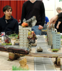 The Slammers try to flush out the sniper by opening fire on a hi-rise