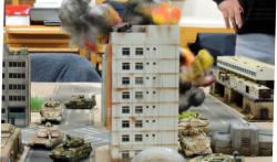 The hi-rise is welland truely on fire but the sniper escapes