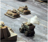 Marzaks pass a buring truck