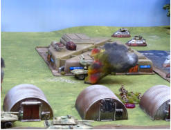 An Arcatinus AA system succumbs to buzzbomb fire from Slammers infantry