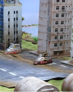 The Slammers place their Combat Cars emerge from alley ways into central Kronstadt