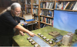 The commander of the Commandos points out a Slammers advance
