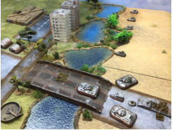 The Slammers begin to cross the river