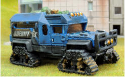 Frost Fighter diecast vehicle with stowage picked out and more added from Brigade and putty, then the tracks drilled and drybrushed/inked