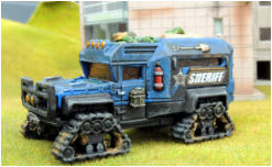 Frost Fighter diecast vehicle with stowage picked out and more added from Brigade and putty, then the tracks drilled and drybrushed/inked