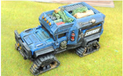 Frost Fighter diecast vehicle with stowage picked out and more added from Brigade and putty, then the tracks drilled and drybrushed/inked