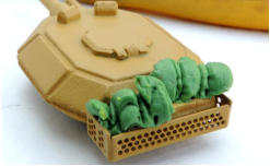 Brigade British vehicles with Ainsty mesh baskets and greenstuff putty tarps plus some spares box items