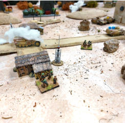 Infantry advance by the burning half tracks