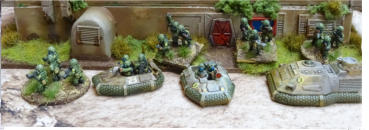 Infantry and jeeps witha heavy GS 934 recce vehicle