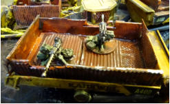 Rear bed of the gun truck with guns but no crew