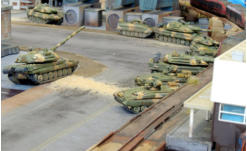 The New Ukrainians form a defensive wall of vehicles beneath the monorail track