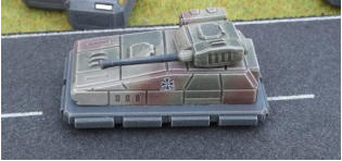 Rheinmetall RA116 Baldur with 6cm Autocannon and missile launcher