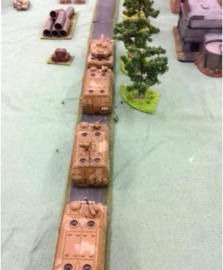 A convoy of an Eisenfaust MBT follwed by three Kastenwagons