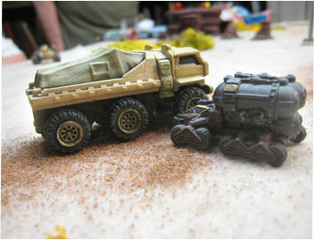 A Red Hand converted gas mining vehicle rams and destroys the supply truck