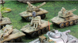 Several Arcatinus AA systems guard the rear of a convoy as a Slammers Blower moves on past