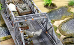 Burning tanks on the bridge