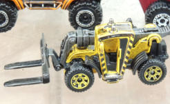 The fork lift has been dipped in a mix of Future and heavy black ink