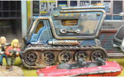 An Arctic Blizzard dozer with 'basetex' mud around its tracks