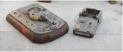 A 15cm powergun armed M2 and an M5 with the roof panels slid open
