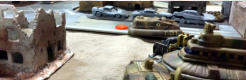 Damaged Legion tank destroyer and a line of destroyed cars
