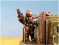 WRY Infantrtyman rides shotgun on a flatbed transporter