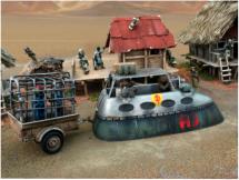 Combat car speeds through the village