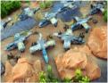 Raven Assault ships and Black Crow landers deploying infantry in hard suits