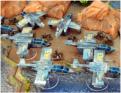 Raven Assault ships and Black Crow landers fly Nap of the Earth over almost any terrain while still using cover when in the combat zone
