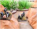 Infantry in hard suits use powergun support weapons and buzzbomb launchers