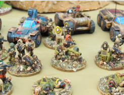 Infantry with Buzzbomb launchers, Hypersonic Missile boxes, regular intantry and sniper teams in front of various vehicles aremed with Infantry with Buzzbomb launchers, Hypersonic Missile boxes, regular intantry and sniper teams in front of vehicles