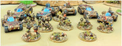 Infantry with Buzzbomb launchers, Hypersonic Missile boxes, regular intantry and sniper teams in front of various vehicles aremed with Infantry with Buzzbomb launchers, Hypersonic Missile boxes, regular intantry and sniper teams in front of vehicles 