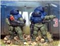 Infantry deploy from a HALO HSAG16. They wear full hard armour and carry advanced assault powerguns and a raid fire support powergun