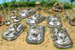 6 tanks in a jungle clearing