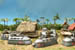 combat cars in jungle preparing to move