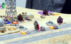 Mounting the berm some Slammers command cars take fire
