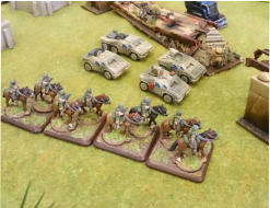 Sulwesi mounted infantry scout ahead of the light vehicles