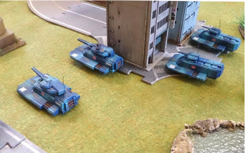 TAS medium tanks and APCs advance
