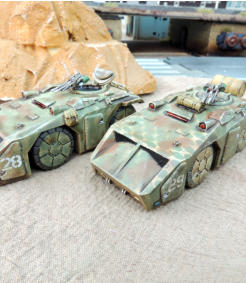 Two M576 vehicles before commander figure was added