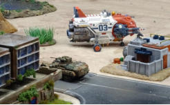 The Br54 advances past a landed space ship