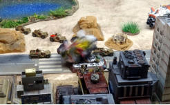 A Uparmoured Blower tank succumbs to missile fire