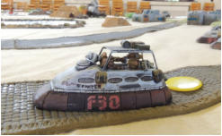 A combat car pushes forward