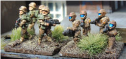 Infantry squad with coil-gun assault rifles and Assault squad with rifles and Support weapon in full armour