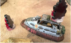 Combat car burning after an RPG attack