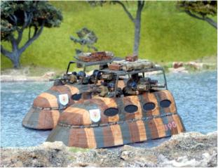 A pair of Combat Cars cross open water