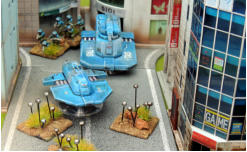 Banshee support vehicle with drones protects a Spectre MICV debussing its infantry