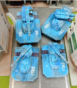 Two Wraiths and two Ghost tanks in the tight confines of city streets